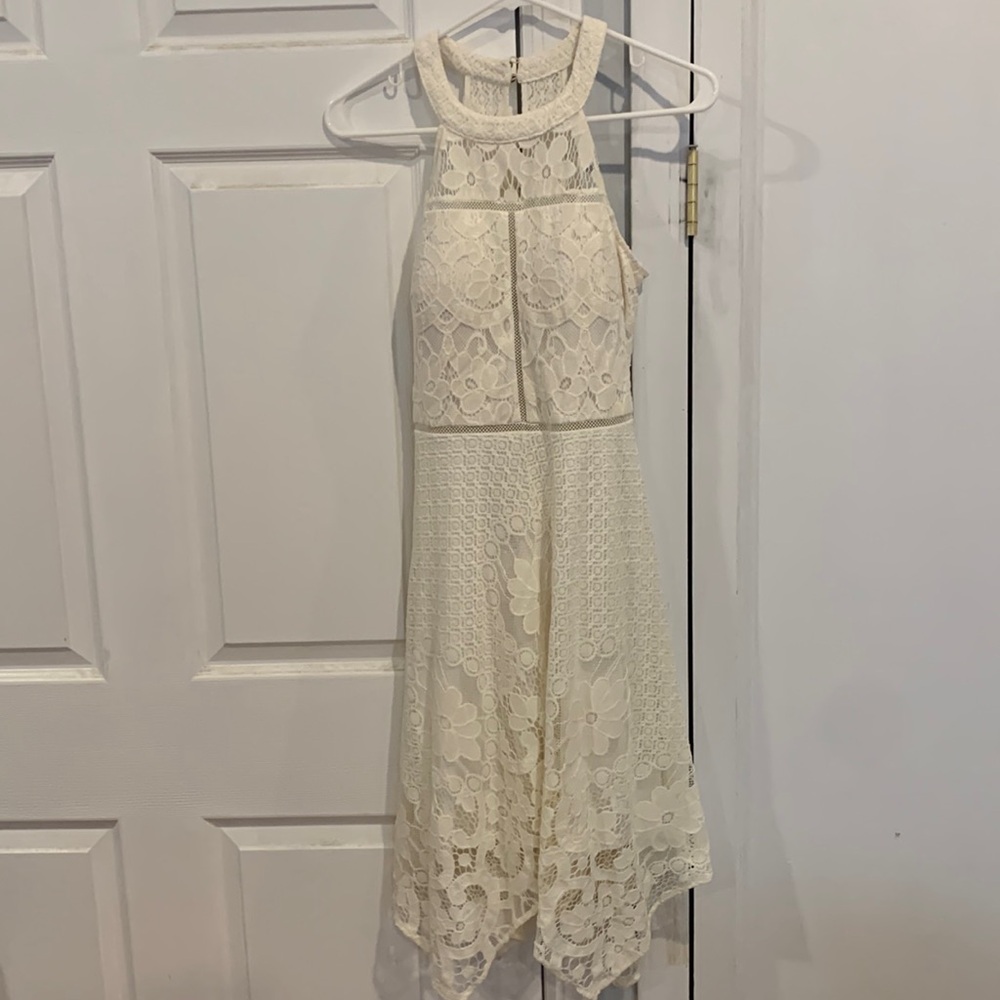 Guess size 4 cream dress. Worn once for graduation. Excellent condition.